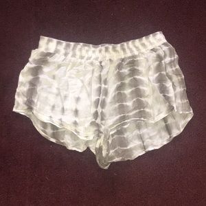 Green and white, Stella laguna beach, shorts.